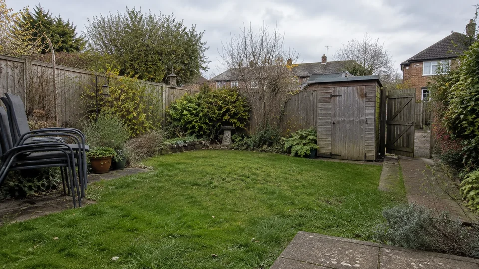 Garden with furniture moved aside and clear access
