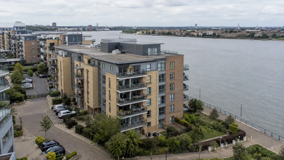 Apartment building and surrounding riverside paths